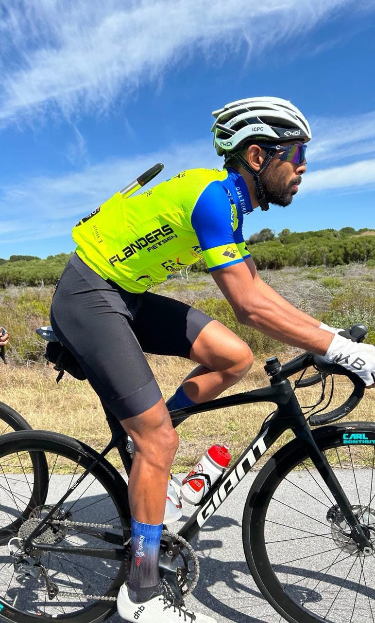 A Kinetic rider on a training ride in the yellow kit