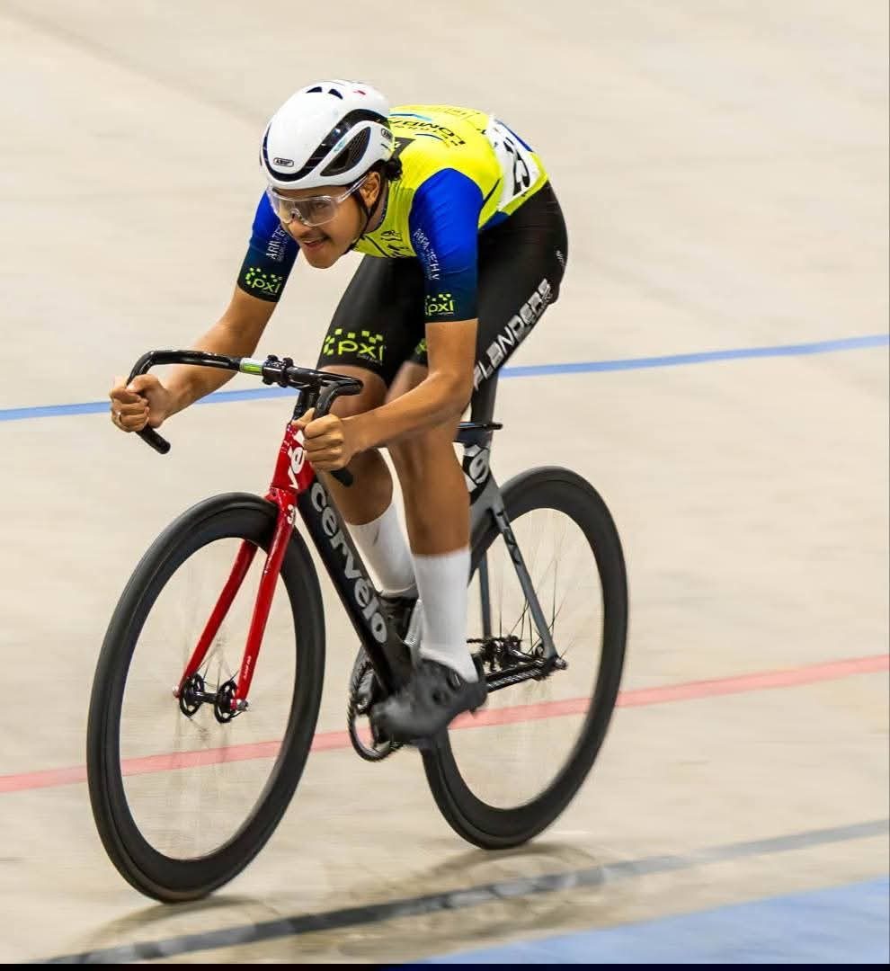 Youth rider on the velodrome in the Kinetic kit
