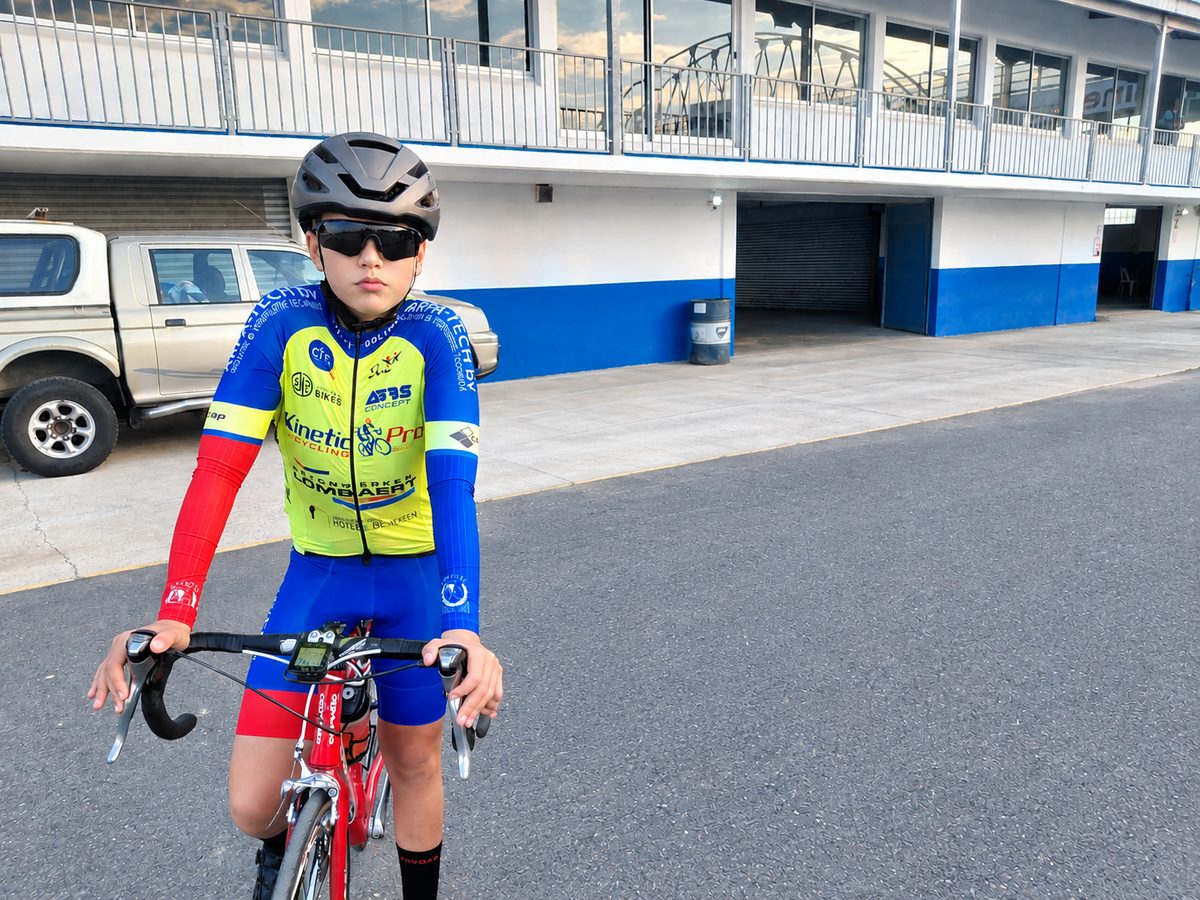 Youth rider with a track bike outside the velodrome